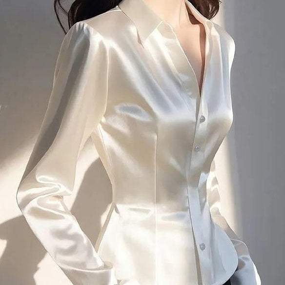 Women's Western Style Shirt - close-up of white fitted button-front blouse with long sleeves