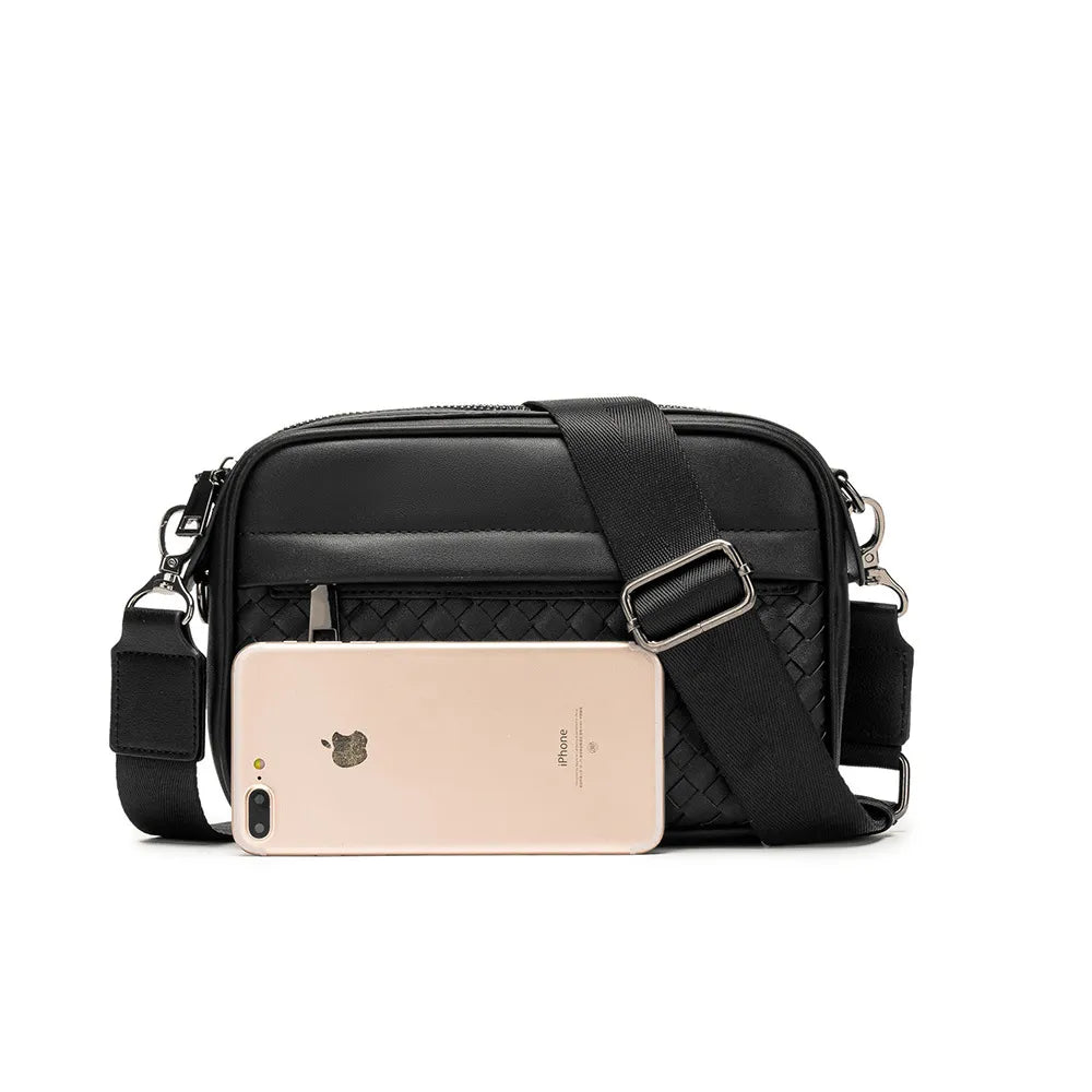 Men's Casual Shoulder Bag - black bag shown beside a phone for scale