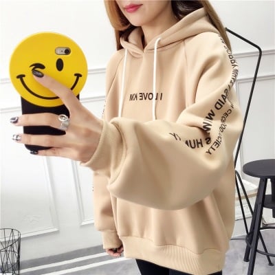 Women's Plus Size Velvet Padded Jacket - model wearing beige printed hoodie with front pouch pocket